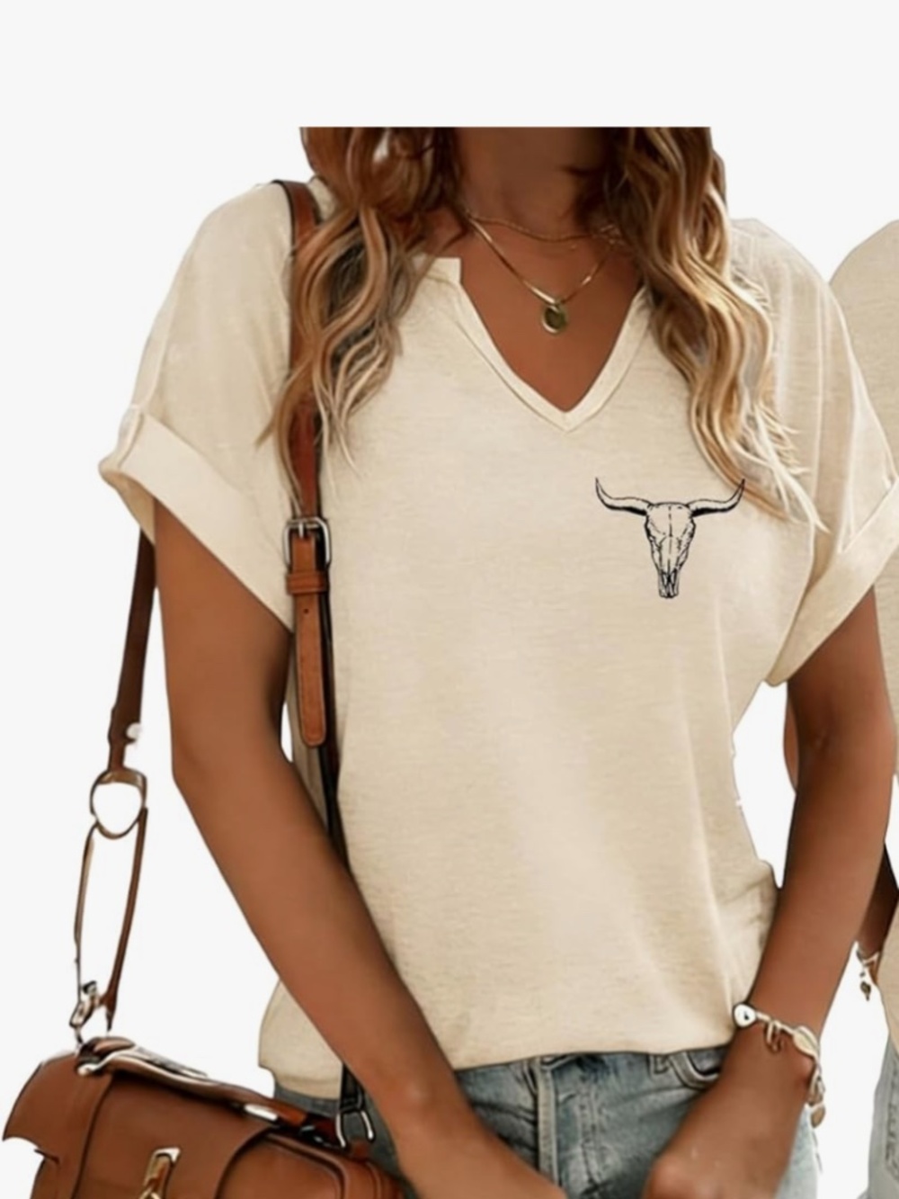Comfortable cream V-neck tee featuring a subtle bull skull graphic on the chest.